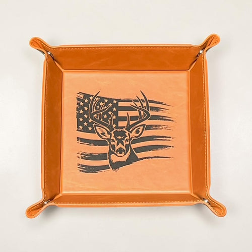 Front view of a Premium Leatherette valet tray with a laser engraved deer and american flag.