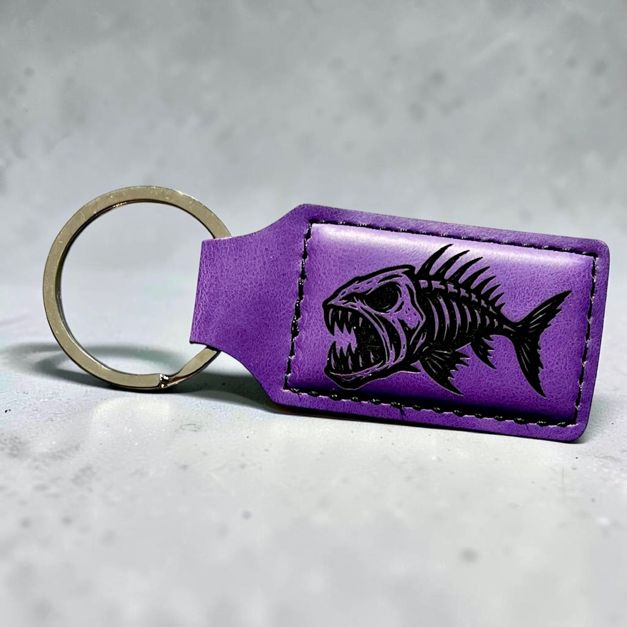 fish-skeleton-violet-keychain