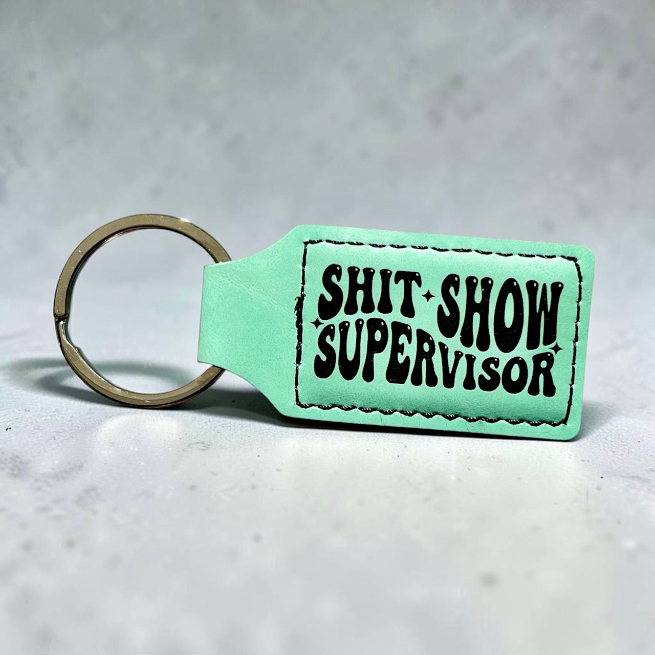 shit-show-supervisor-seafoam-keychain