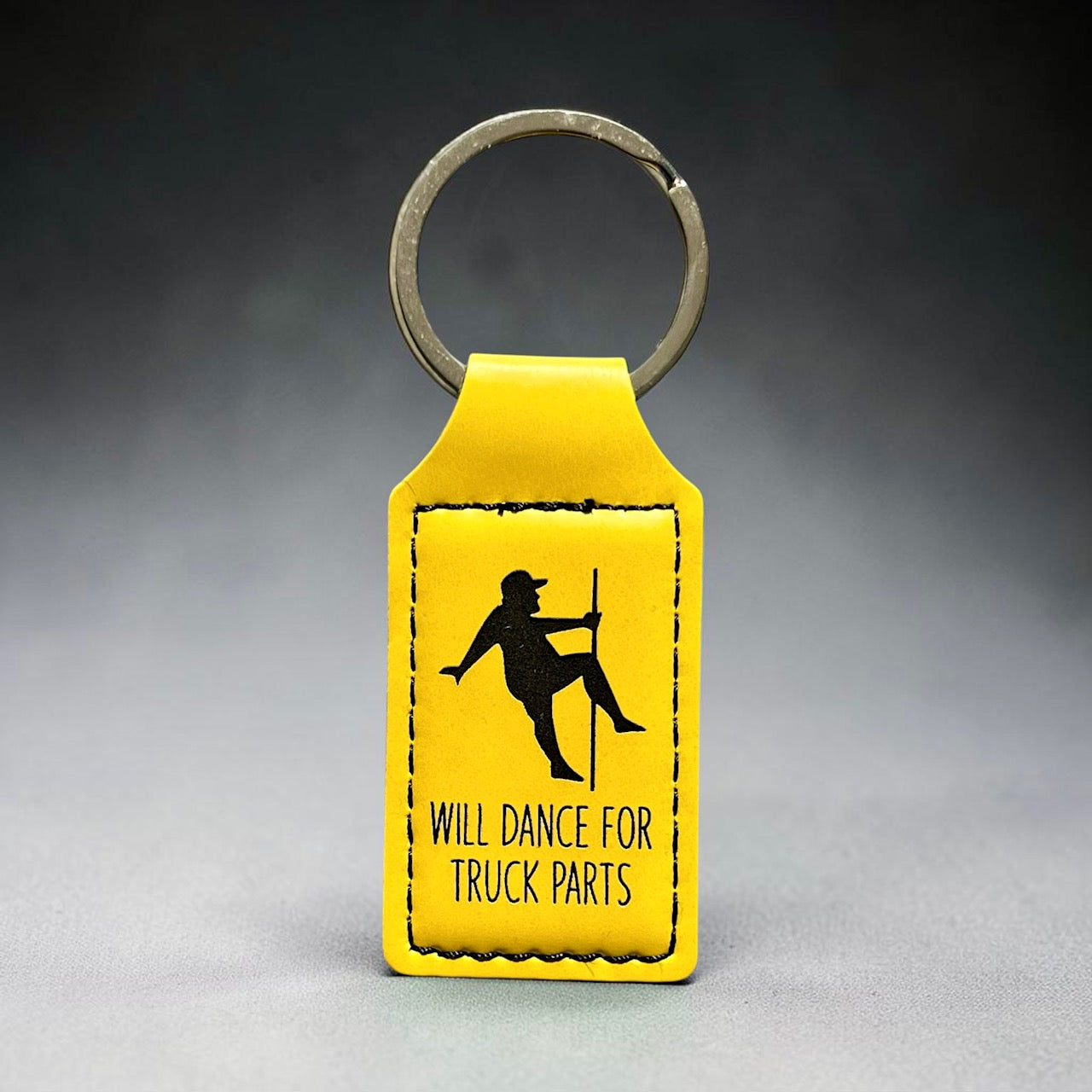 will-dance-for-truck-parts-yellow-keychain